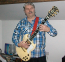 Mick Smith: Guitar, Bass & Banjo Lessons. Tutor For Blackburn And Nearby. logo