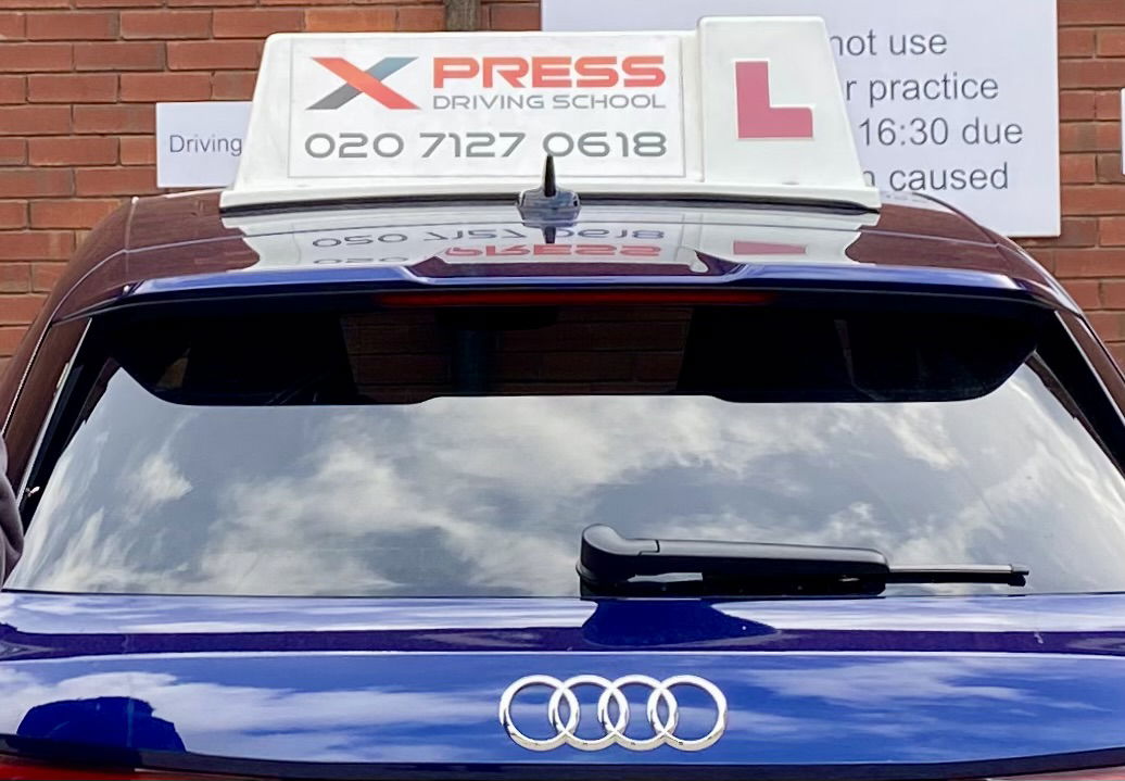 Xpress Driving School logo