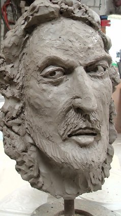Sculpt a human face in clay